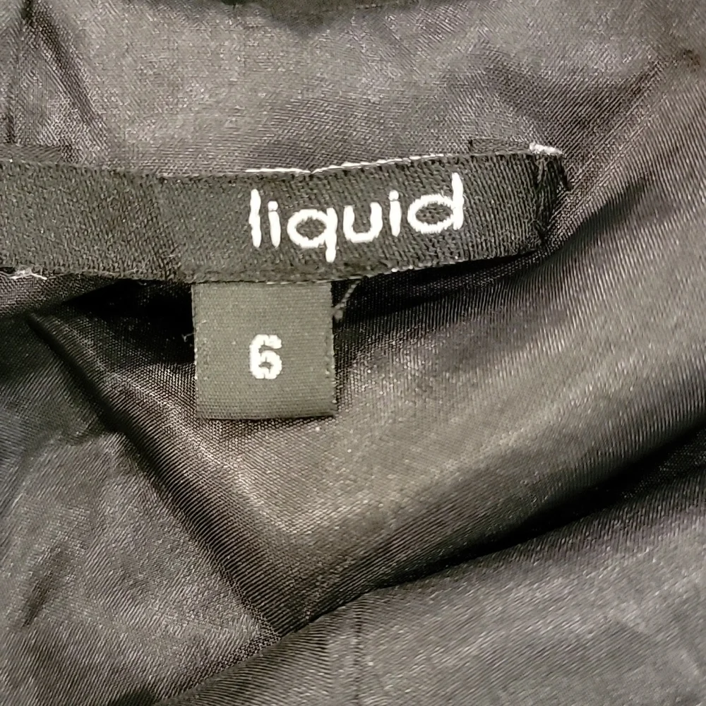 LIQUID Black Sleeveless Rolling Ruffle Dress - Picture 4 of 6